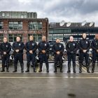 Seattle Police Department Motorcycle officers standing on the top level of the T-Mobile field parking garage